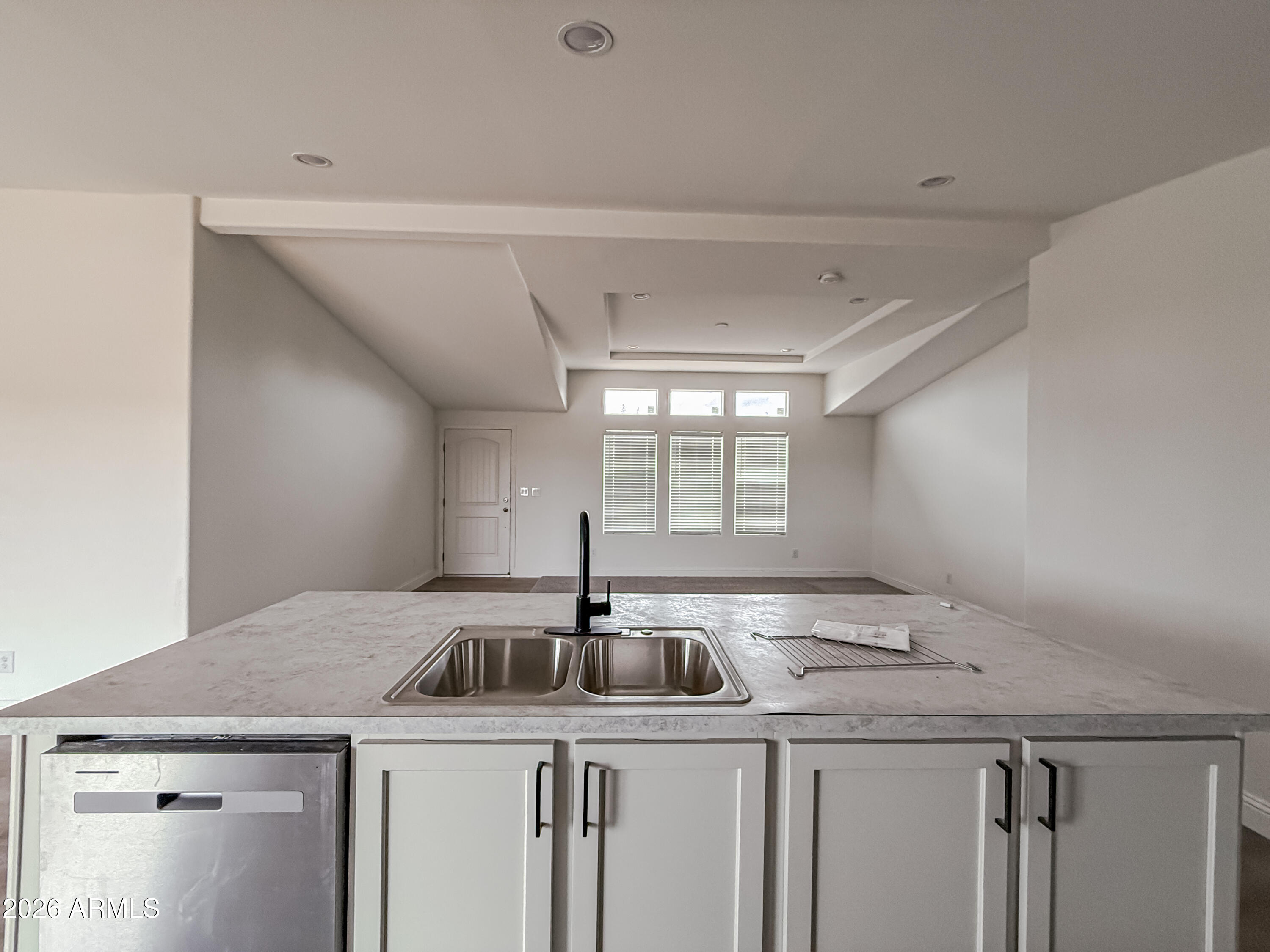 22775 East Day Spring Lane Florence, AZ 85132 - Photo 6 of 16 a kitchen with a sink a stove and cabinets