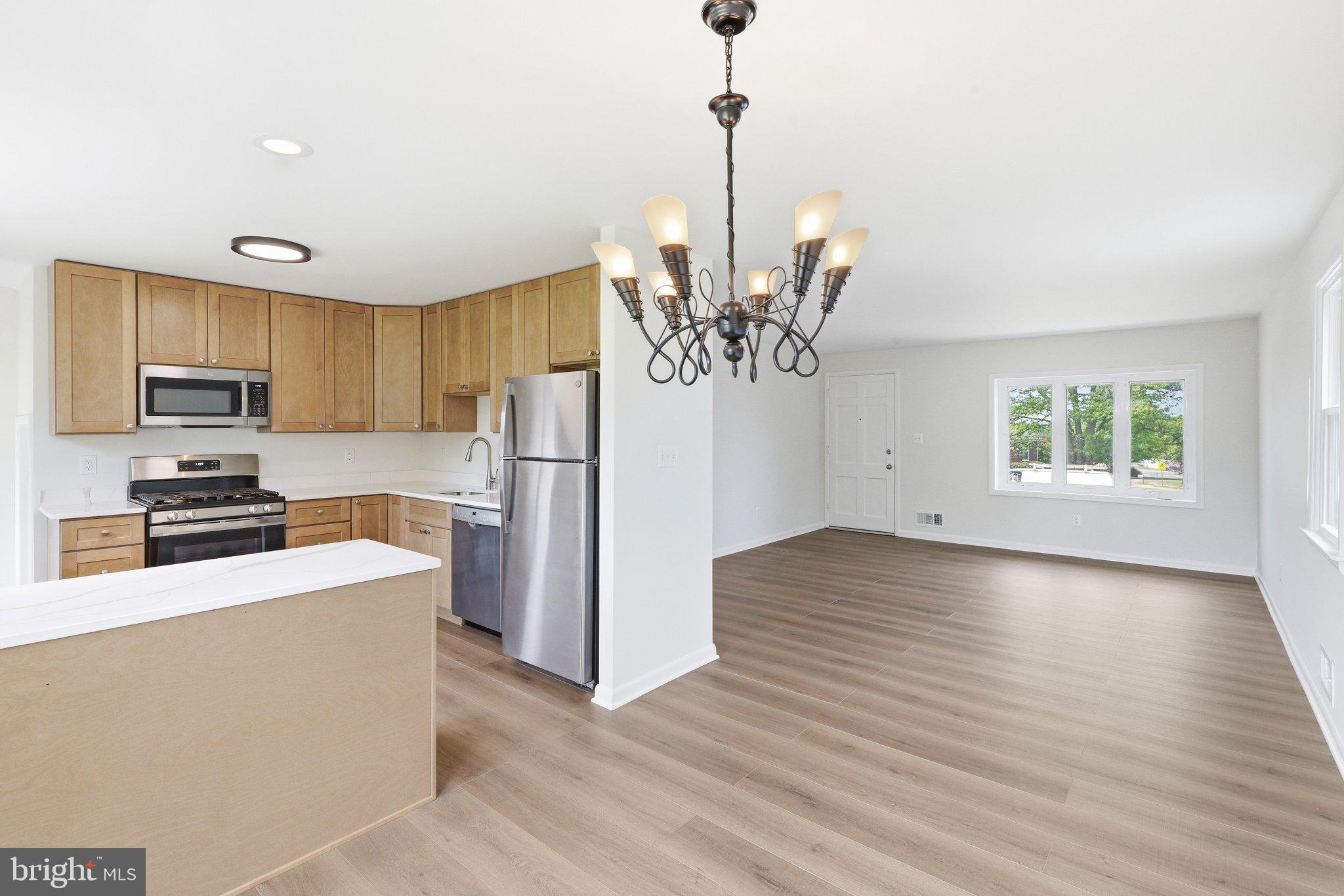 9005 Perring Park Road Baltimore, MD 21234 - Photo 5 of 20 Bright & airy open-concept w/tasteful lighting