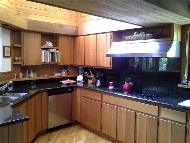 157 South River Road Stuart, FL 34996 - Photo 15 of 23 a kitchen with a sink cabinets and window