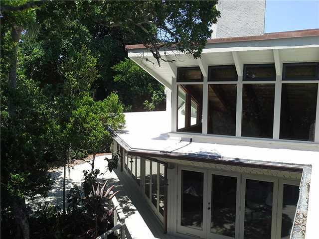 157 South River Road Stuart, FL 34996 - Photo 18 of 23 a view of house with outdoor space and sitting area
