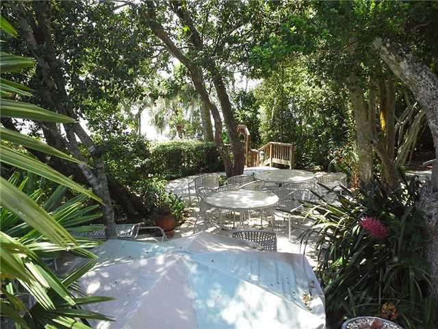 157 South River Road Stuart, FL 34996 - Photo 19 of 23 a view of a tree with a yard