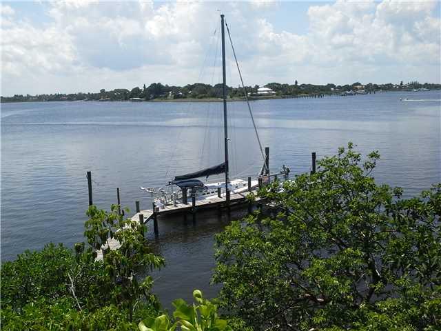 157 South River Road Stuart, FL 34996 - Photo 2 of 23 a view of a lake with a mountain view