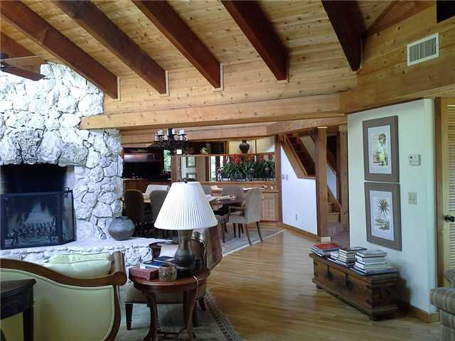 157 South River Road Stuart, FL 34996 - Photo 7 of 23 a living room with furniture and a fireplace