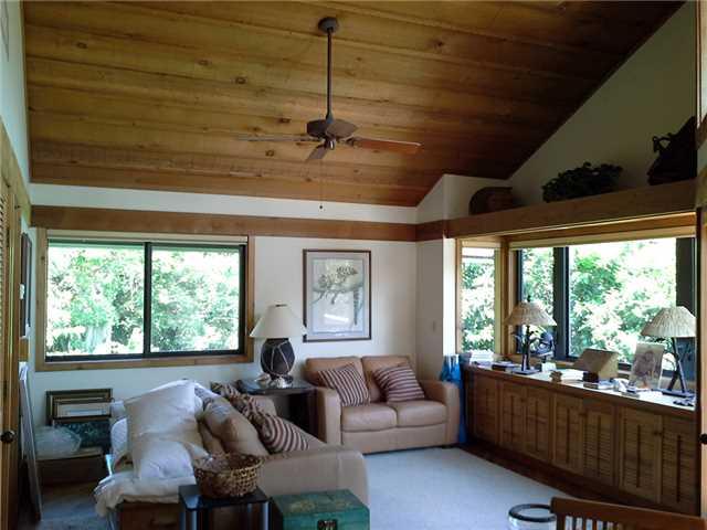 157 South River Road Stuart, FL 34996 - Photo 10 of 23 a living room with furniture and a large window