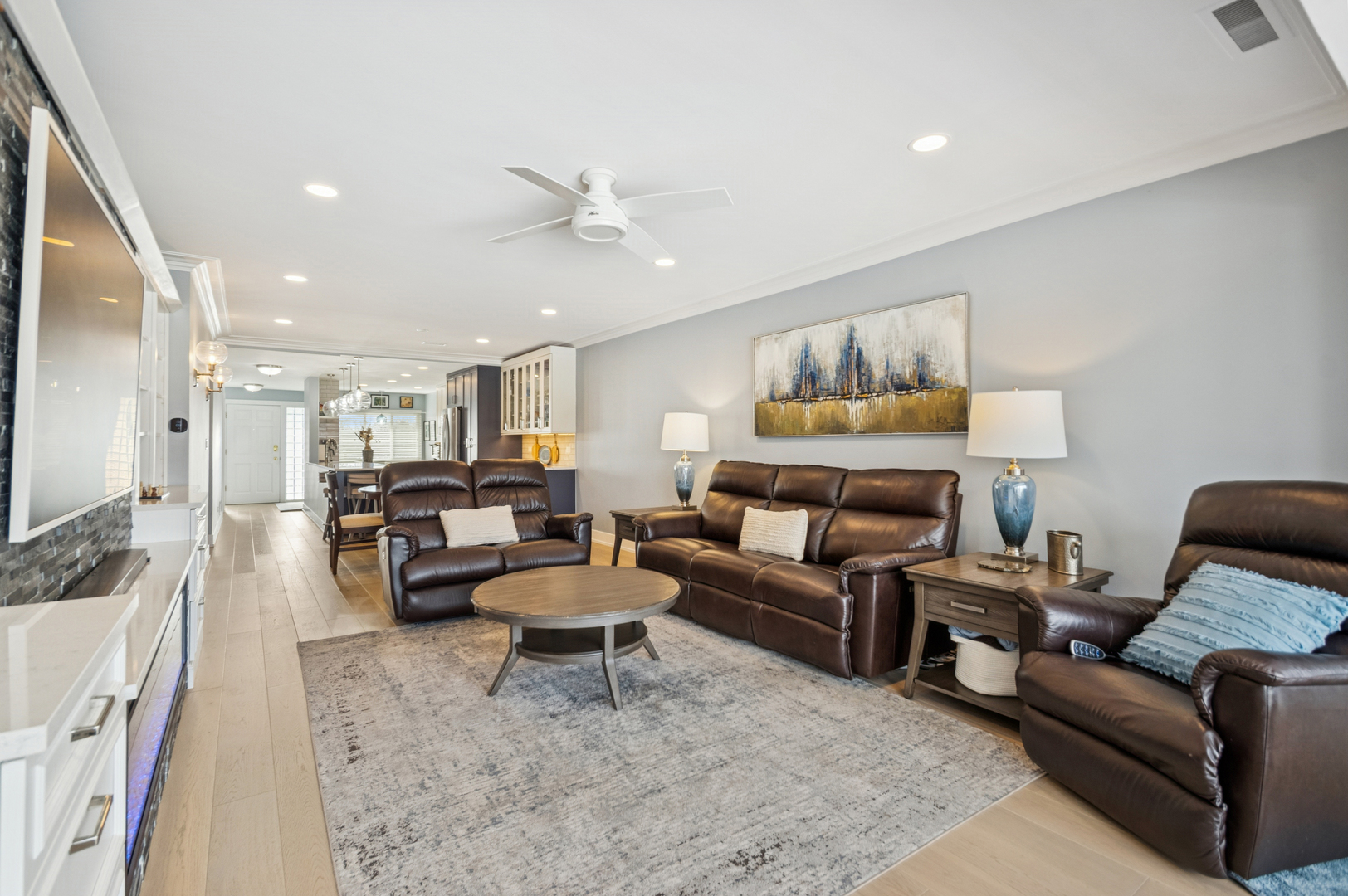 1 North Dee Road, Unit 3G Park Ridge, IL 60068 - Photo 14 of 24 a living room with furniture and a flat screen tv