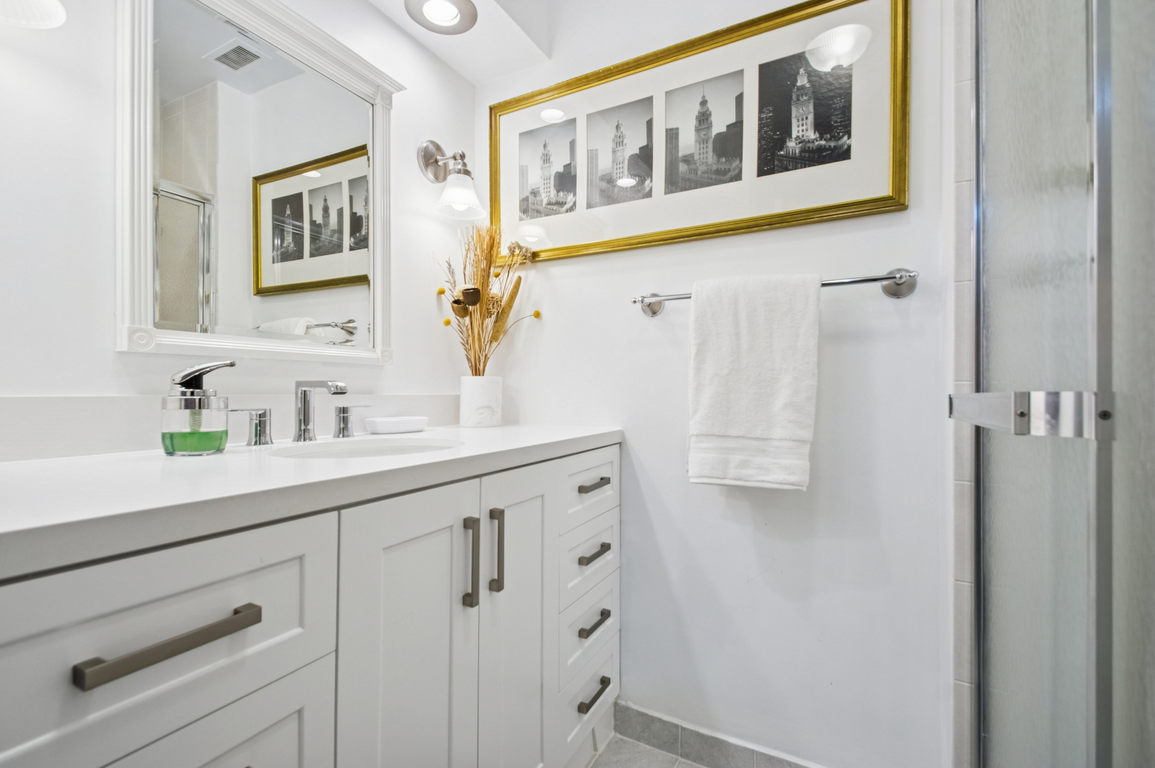 1 North Dee Road, Unit 3G Park Ridge, IL 60068 - Photo 18 of 24 a bathroom with a sink a mirror a vanity