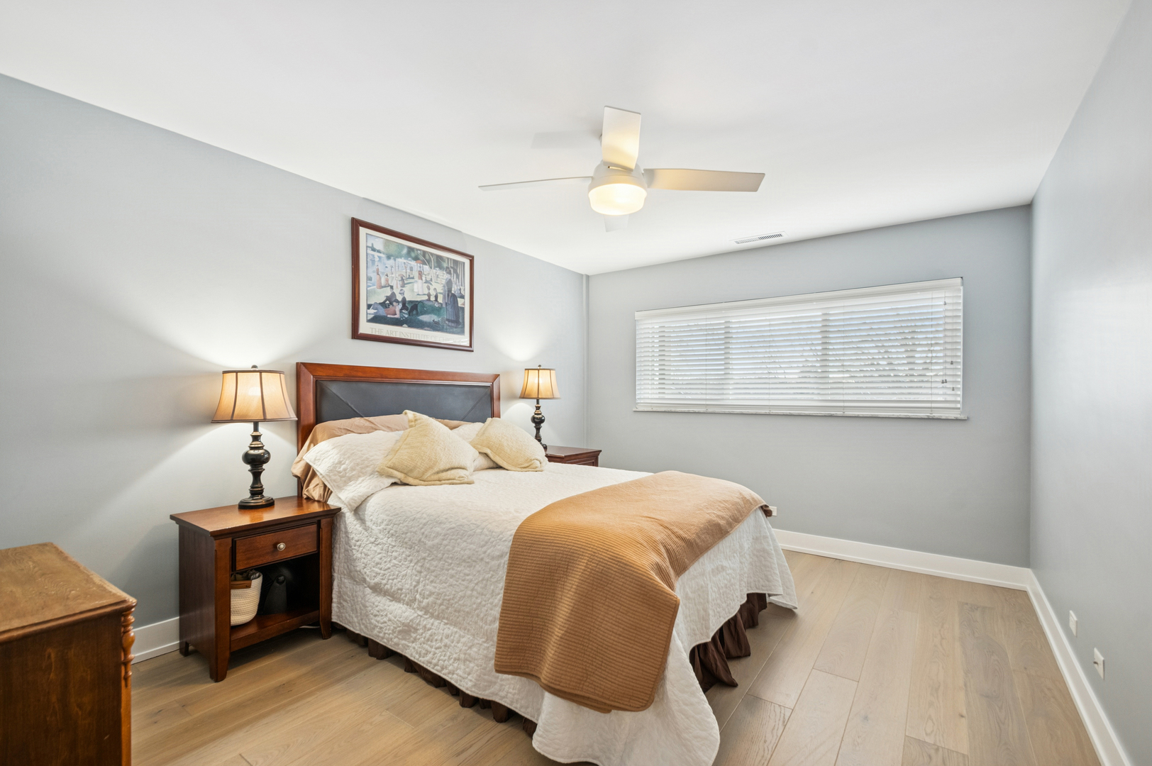 1 North Dee Road, Unit 3G Park Ridge, IL 60068 - Photo 19 of 24 a bedroom with a bed and a window