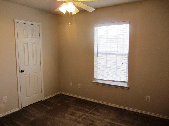 6514 89th Street Lubbock, TX 79424 - Photo 9 of 10 an empty room with a window