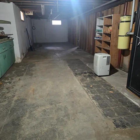 a view of an empty room with empty shelves
