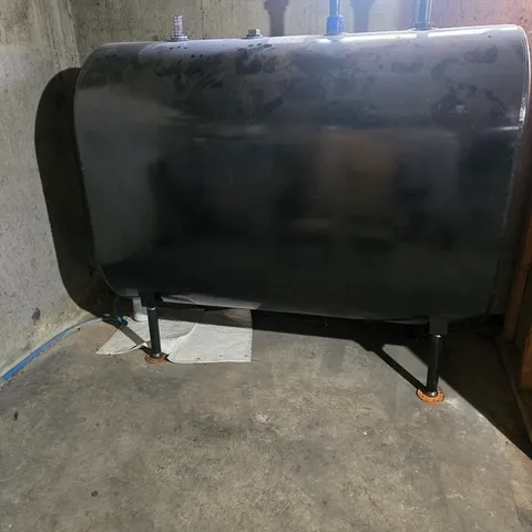 a view of gym equipment and refrigerator