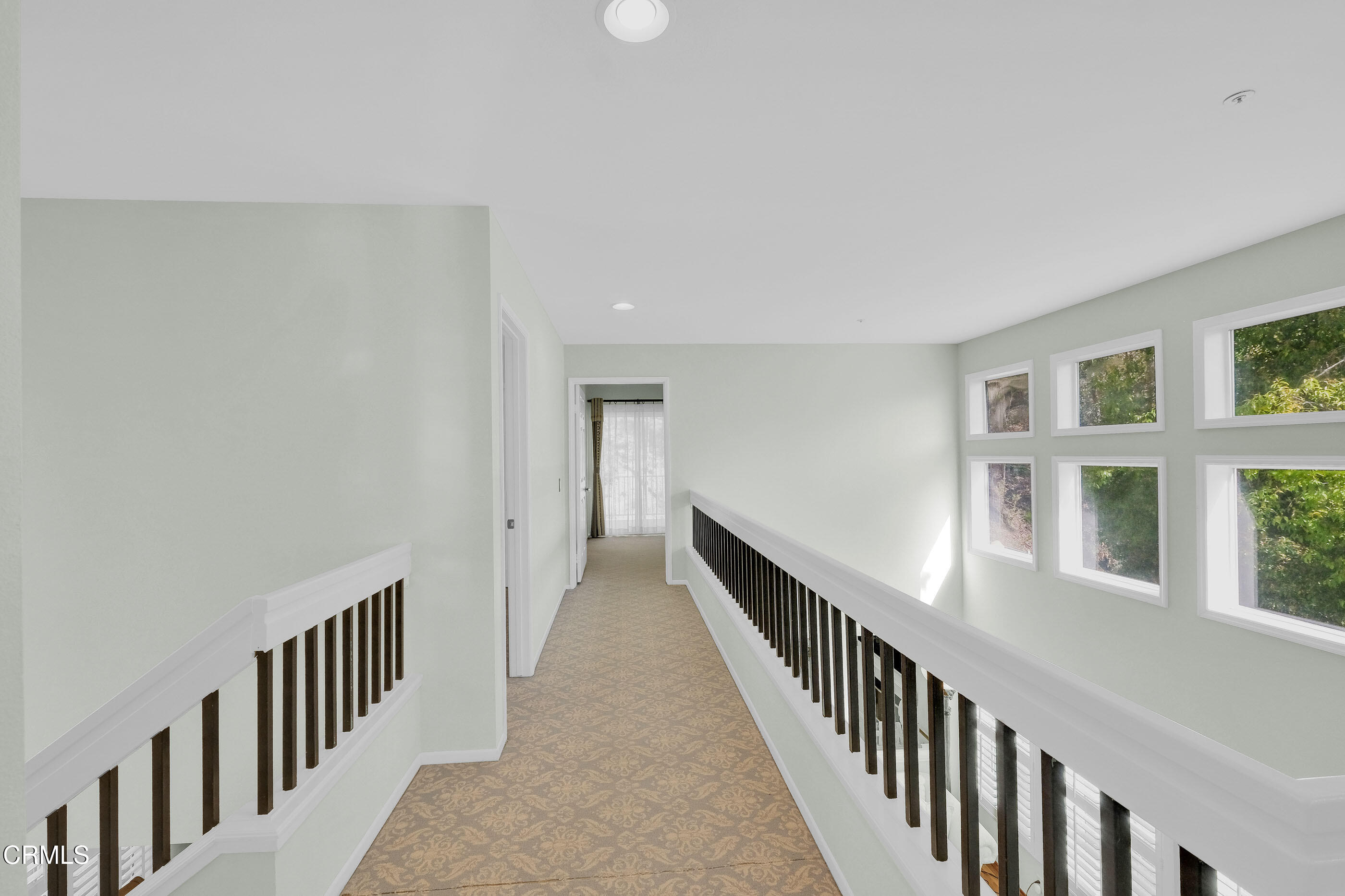 878 Calle La Primavera Glendale, CA 91208 - Photo 14 of 35 a view of a hallway with windows