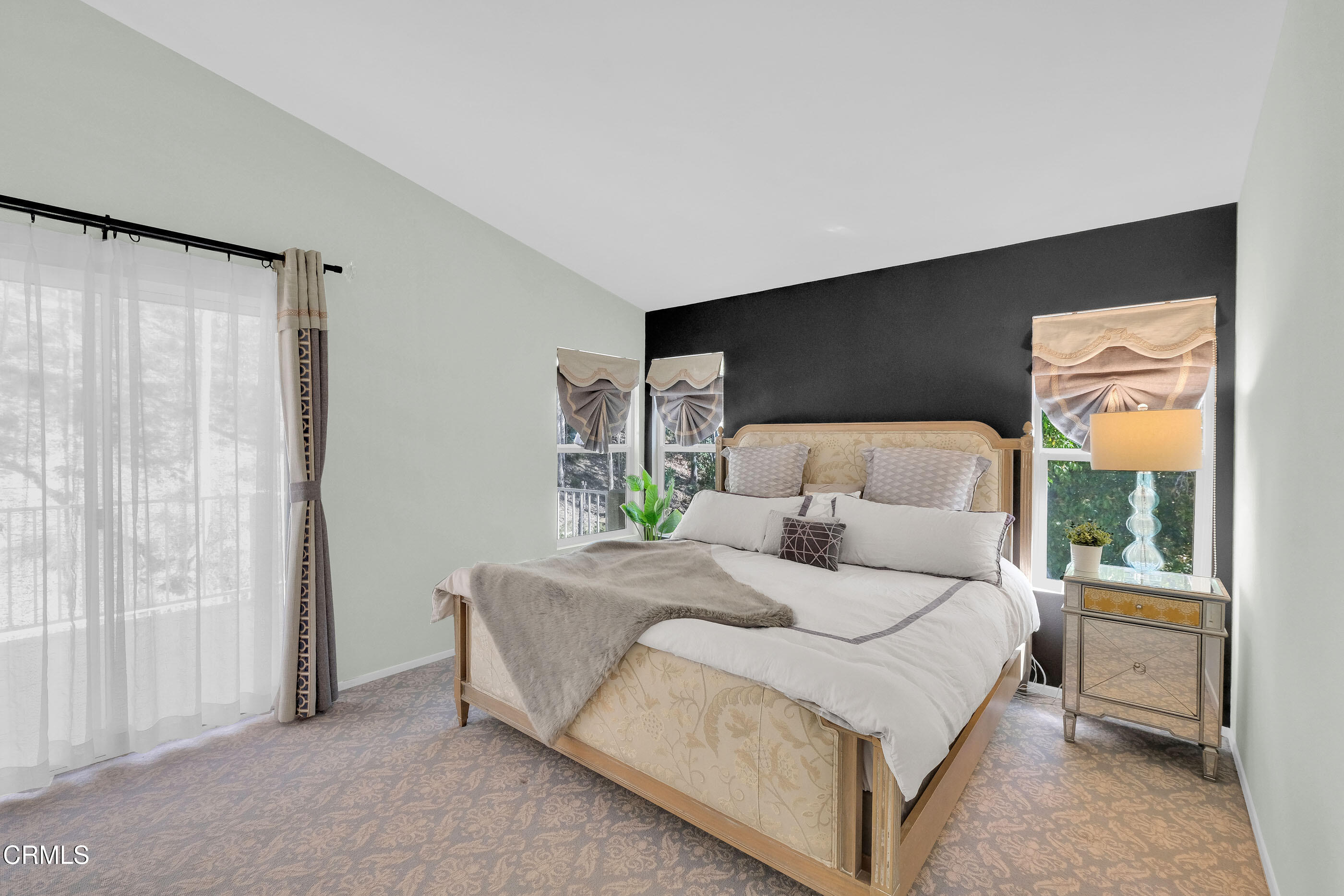 878 Calle La Primavera Glendale, CA 91208 - Photo 16 of 35 a bedroom with a bed and a window