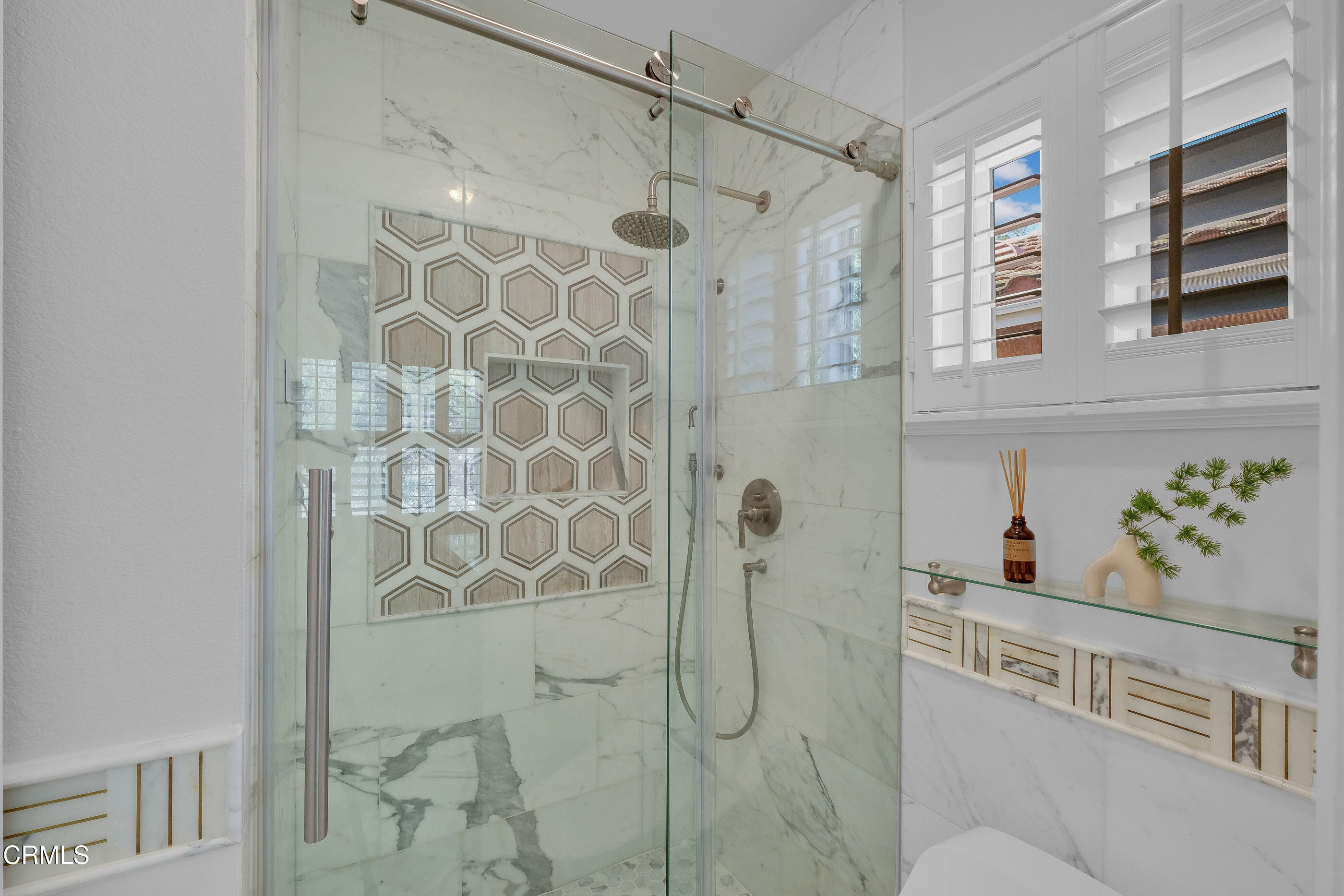 878 Calle La Primavera Glendale, CA 91208 - Photo 20 of 35 a bathroom with a shower curtain and a sink