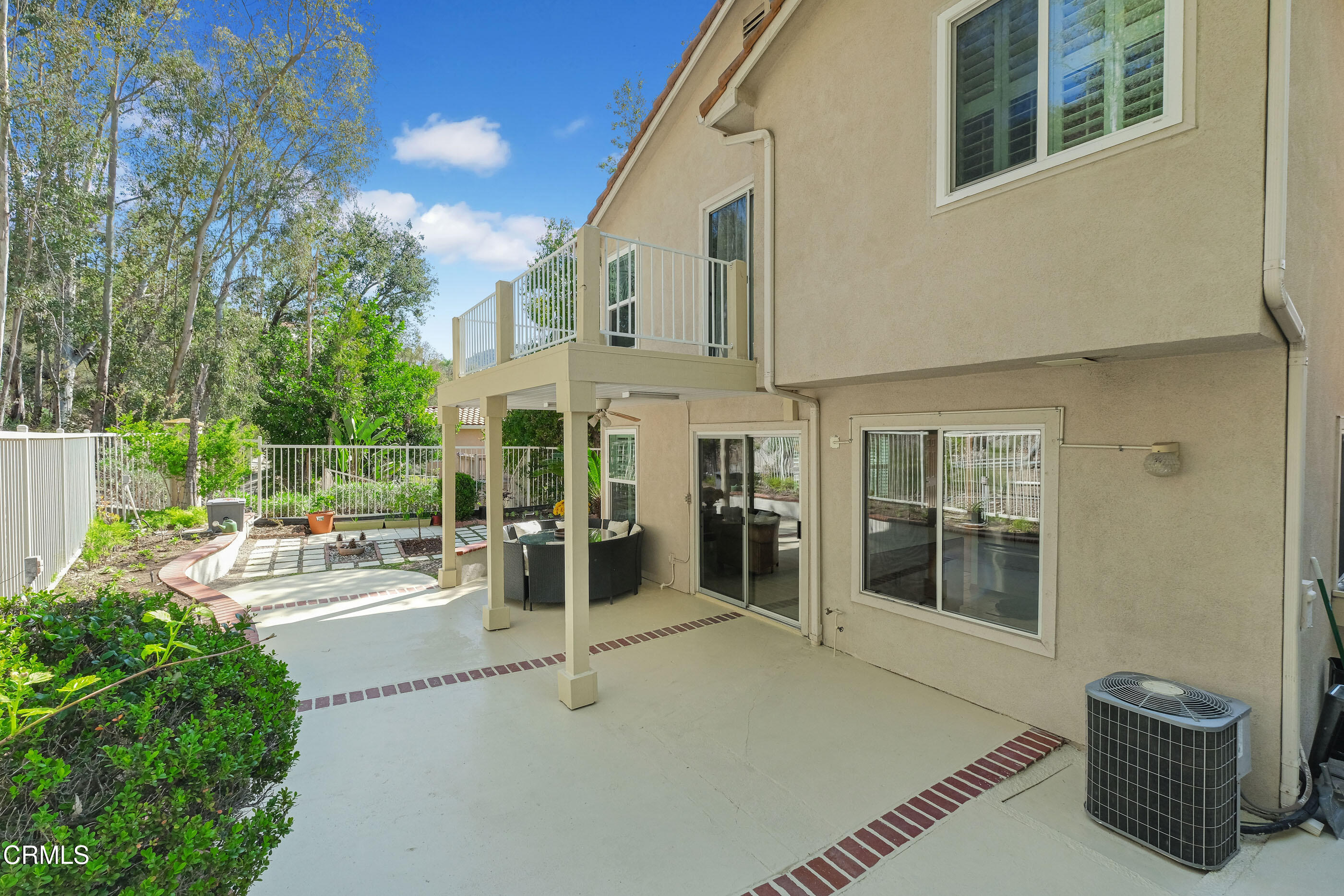 878 Calle La Primavera Glendale, CA 91208 - Photo 26 of 35 a view of a patio with table and chairs and potted plants