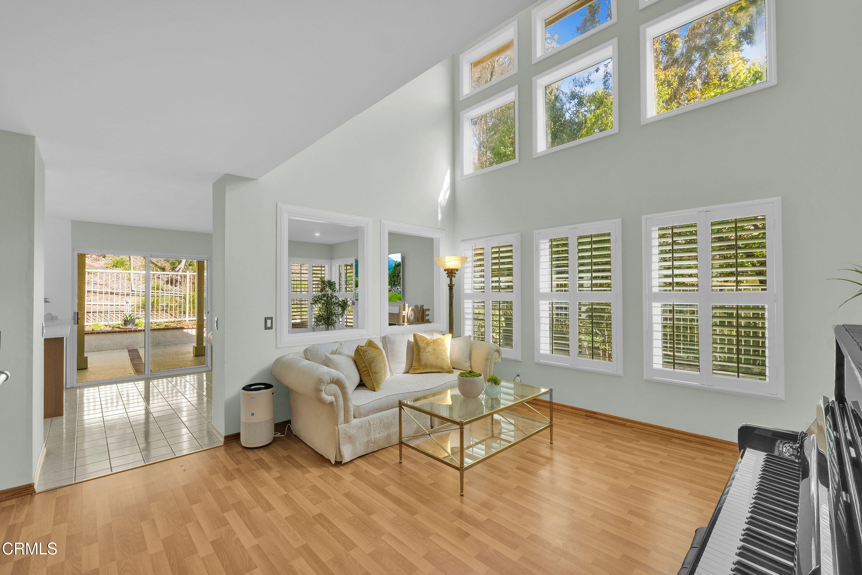 878 Calle La Primavera Glendale, CA 91208 - Photo 3 of 35 a living room with furniture and large windows