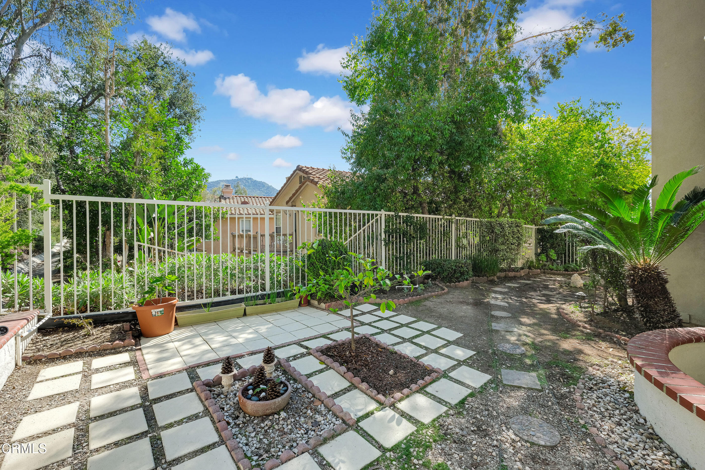 878 Calle La Primavera Glendale, CA 91208 - Photo 31 of 35 a view of a chair and tables on the patio