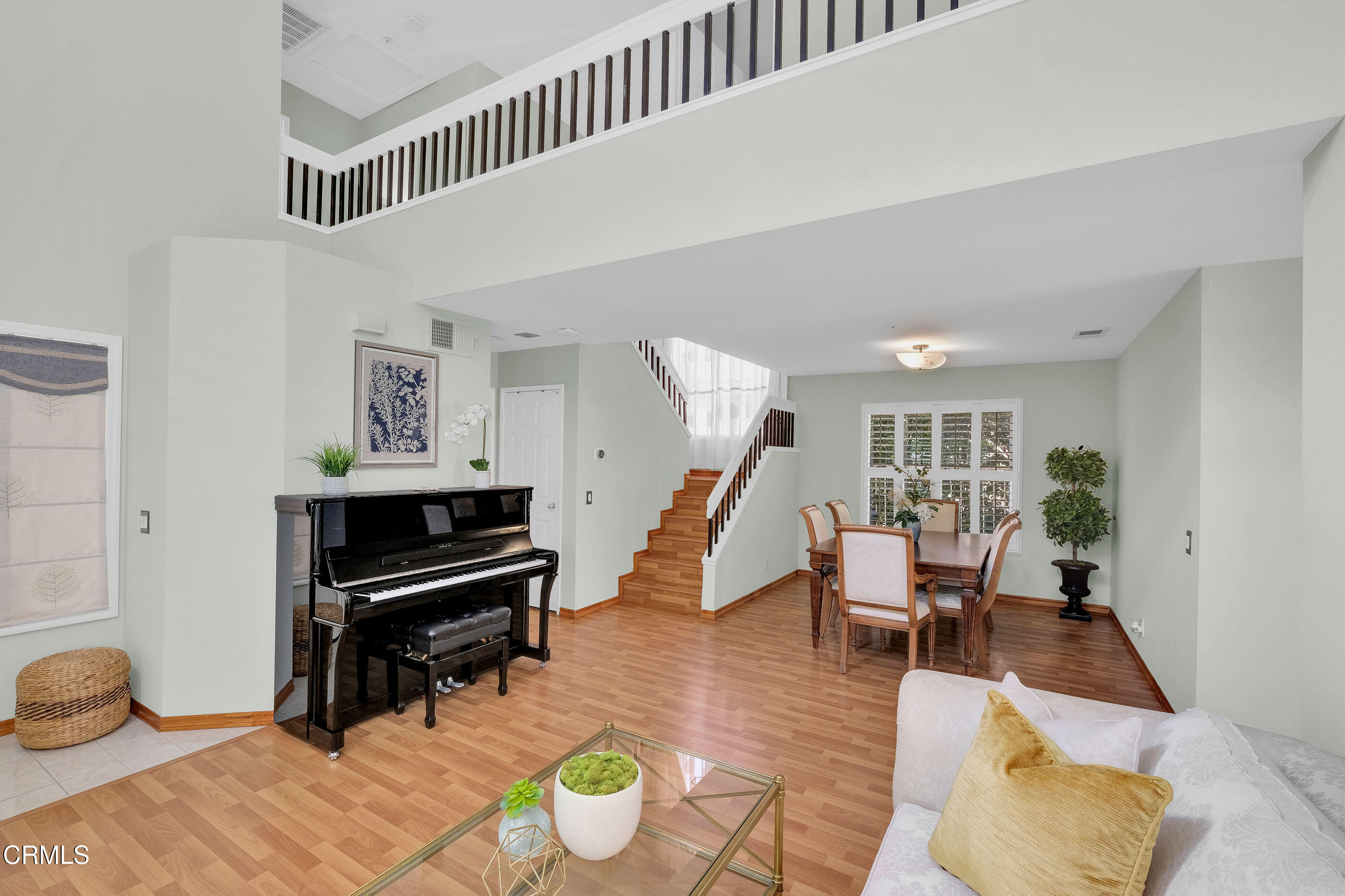 878 Calle La Primavera Glendale, CA 91208 - Photo 5 of 35 a living room with furniture and a wooden floor