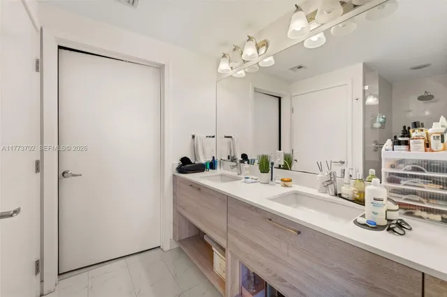 a view of roof deck with chair and wooden floor