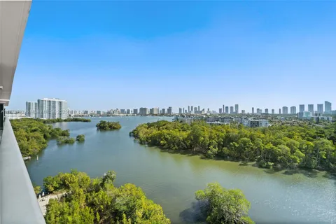 a view of a lake with a city