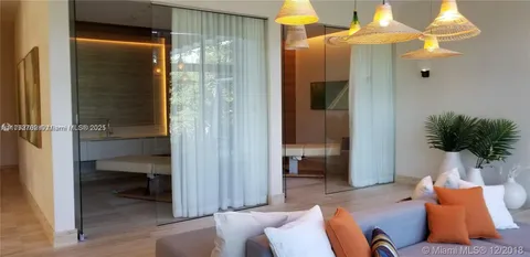 a bed room with a bed and a window