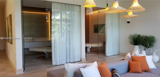 a bed room with a bed and a window