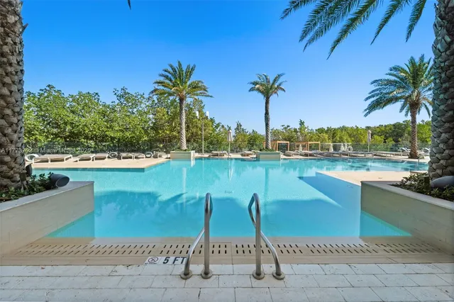 a view of a palm tree from a patio
