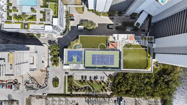 a view of a large body of water with an outdoor seating