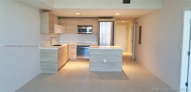 a bathroom with a sink double vanity and a mirror