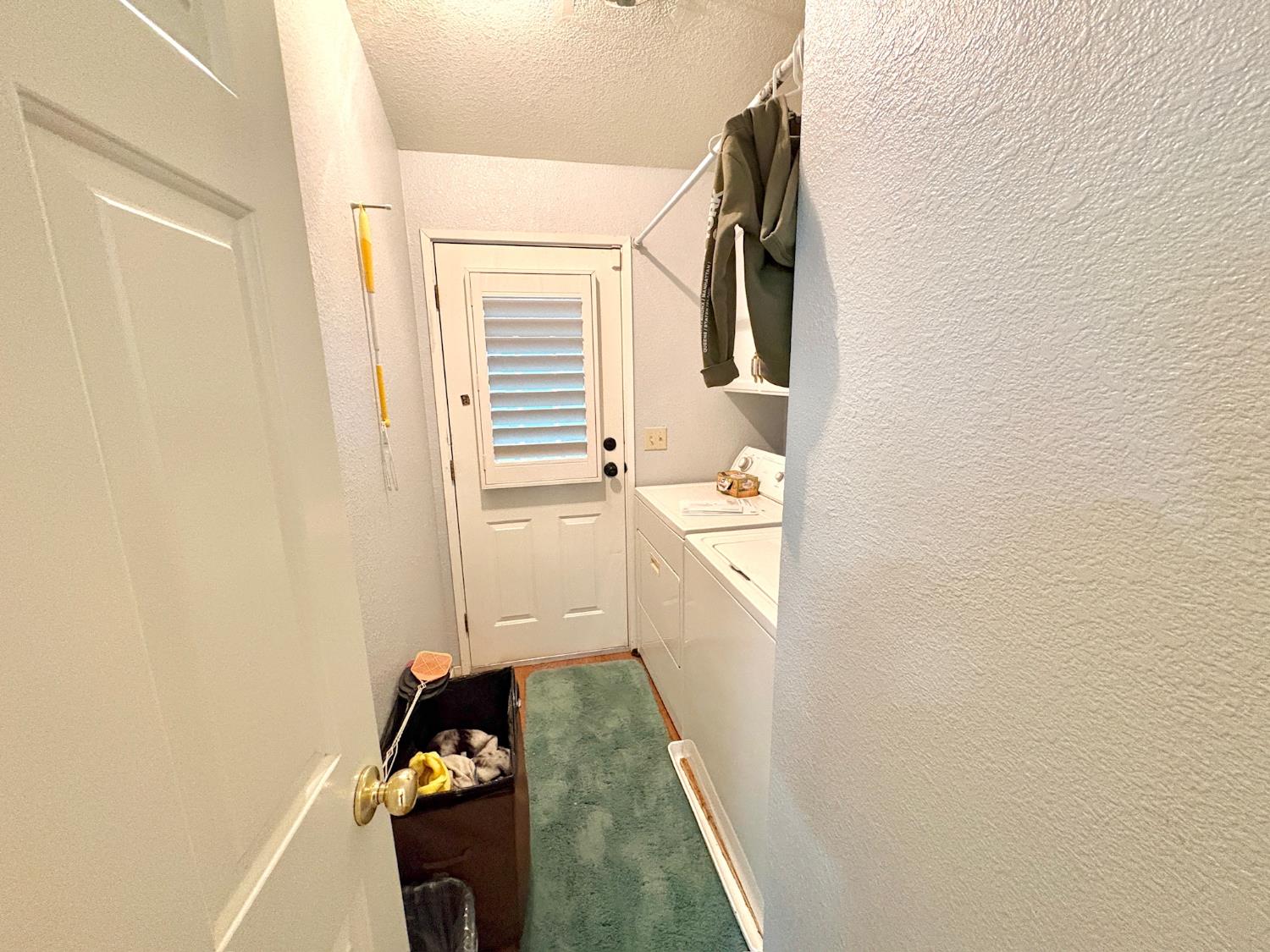1500 Held Drive, Unit 100 Modesto, CA 95355 - Photo 12 of 59 a bathroom with a sink and a mirror