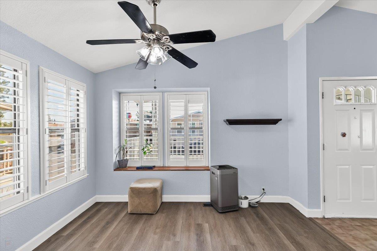 1500 Held Drive, Unit 100 Modesto, CA 95355 - Photo 22 of 59 a living room with furniture and a window