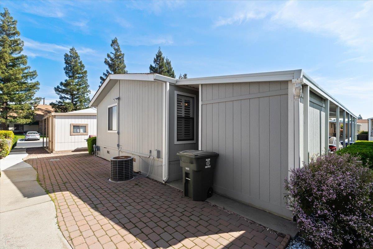 1500 Held Drive, Unit 100 Modesto, CA 95355 - Photo 31 of 59 a view of a house with backyard and sitting area