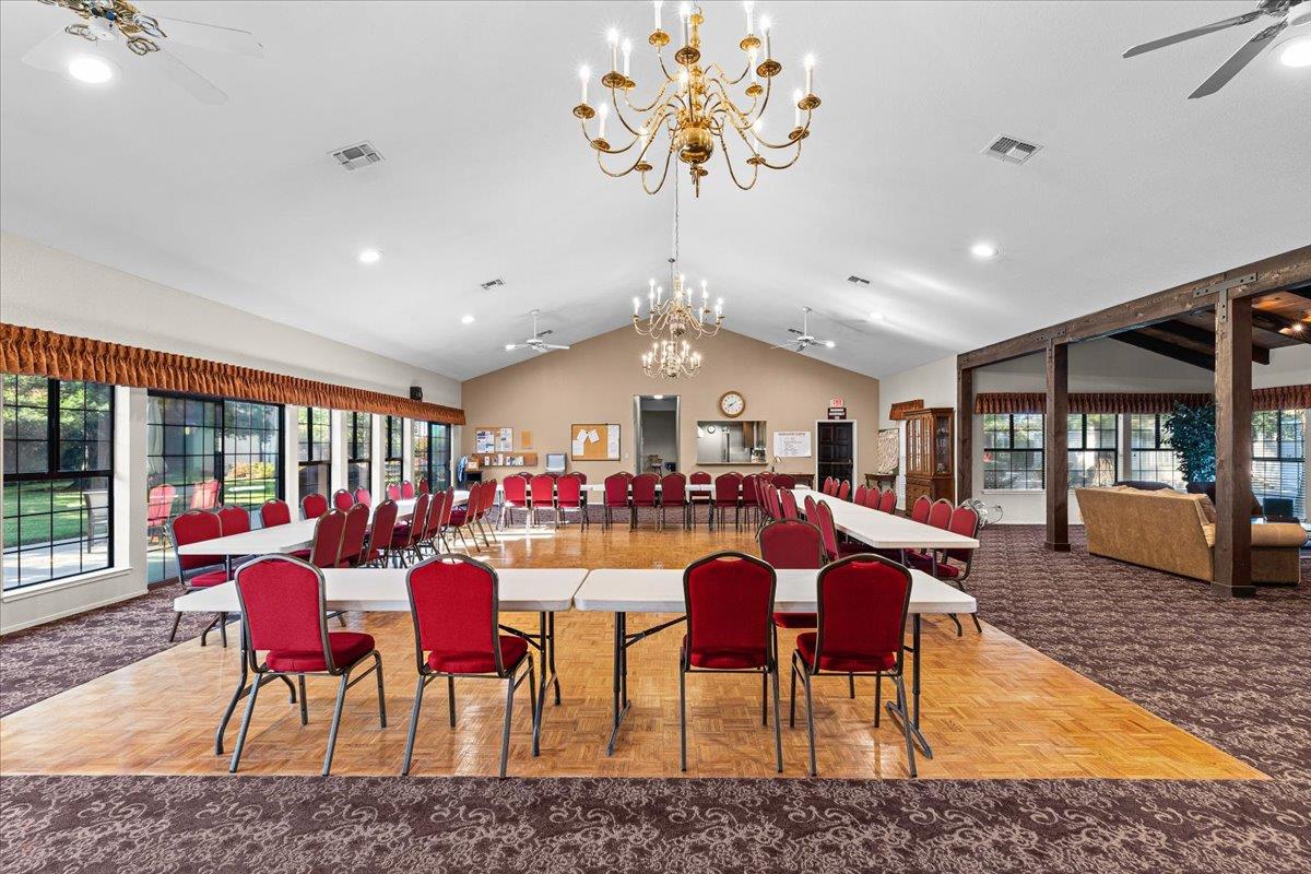 1500 Held Drive, Unit 100 Modesto, CA 95355 - Photo 43 of 59 a view of a dining room with furniture window and wooden floor