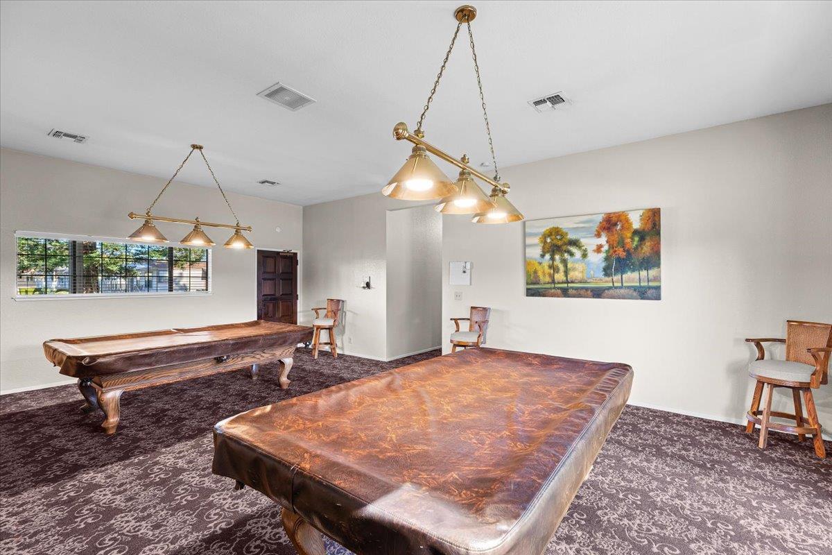 1500 Held Drive, Unit 100 Modesto, CA 95355 - Photo 49 of 59 a room with pool table and windows