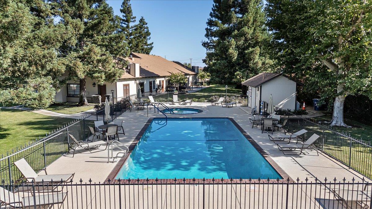 1500 Held Drive, Unit 100 Modesto, CA 95355 - Photo 53 of 59 a view of a house with backyard and sitting area