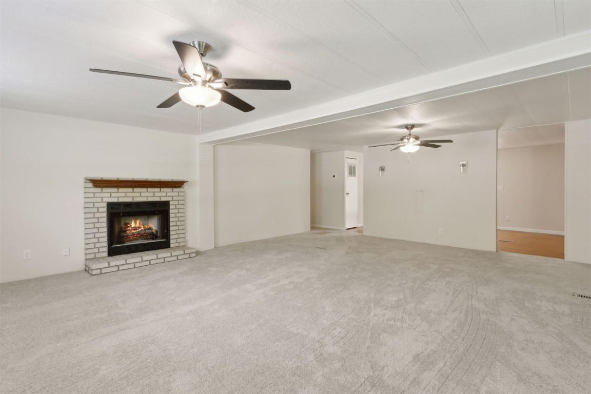 2889 Santa Fe Trail Hilliard, FL 32046 - Photo 21 of 49 a view of an empty room with a fireplace