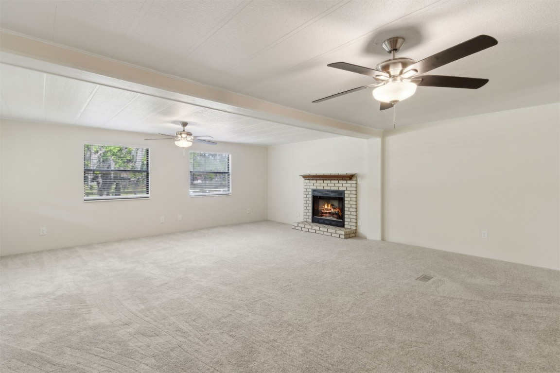 2889 Santa Fe Trail Hilliard, FL 32046 - Photo 22 of 49 an empty room with windows and fan