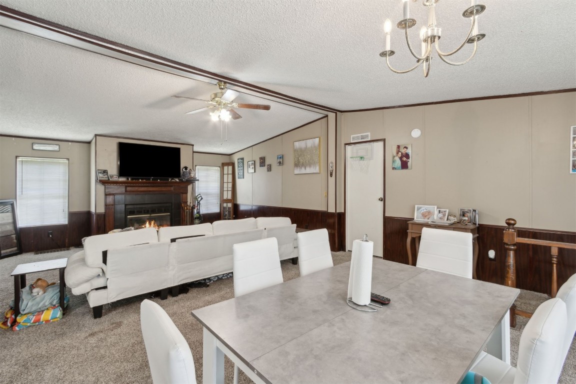 2889 Santa Fe Trail Hilliard, FL 32046 - Photo 38 of 49 a living room with furniture and a flat screen tv