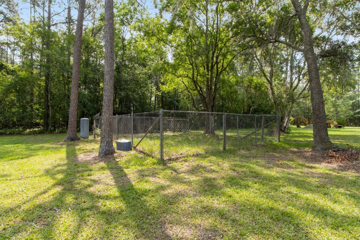 2889 Santa Fe Trail Hilliard, FL 32046 - Photo 47 of 49 a swimming pool that is in the garden