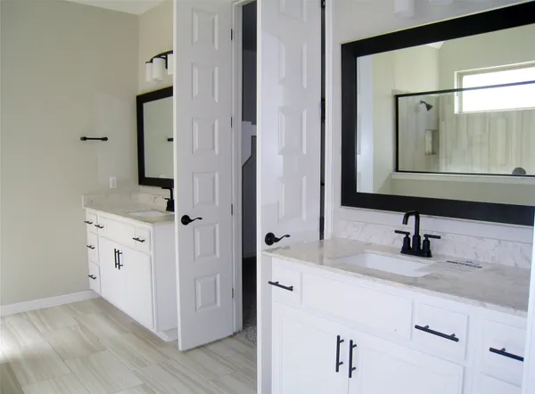 a view of a storage & utility room with washer and dryer