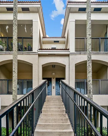 a view of a brick building with many windows