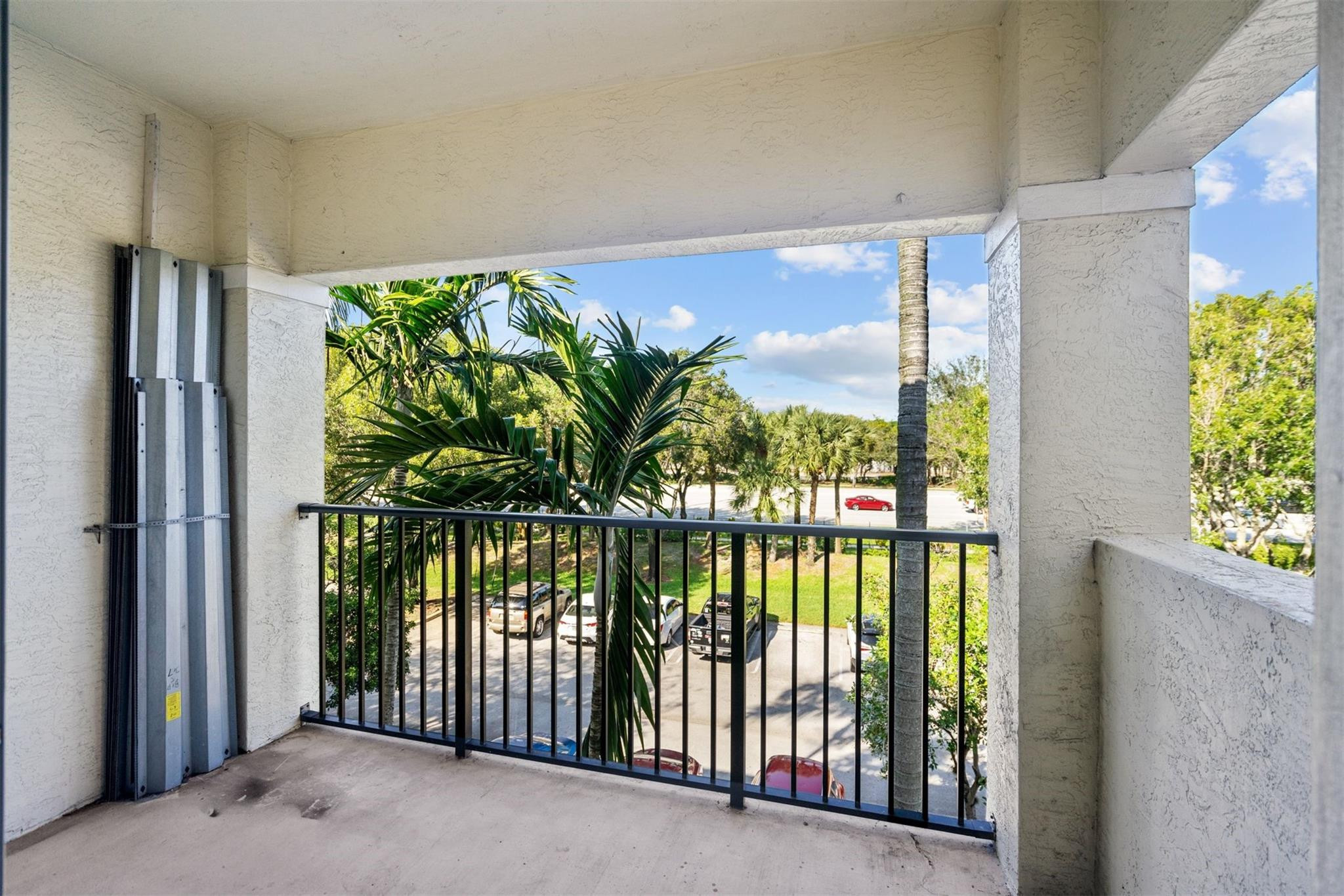 5880 West Sample Road, Unit 307 Coral Springs, FL 33067 - Photo 11 of 25 a view of a porch