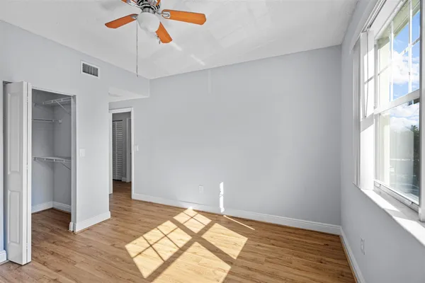a view of an empty room and window