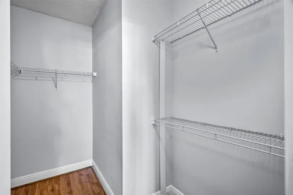 a view of a room with racks on the wall