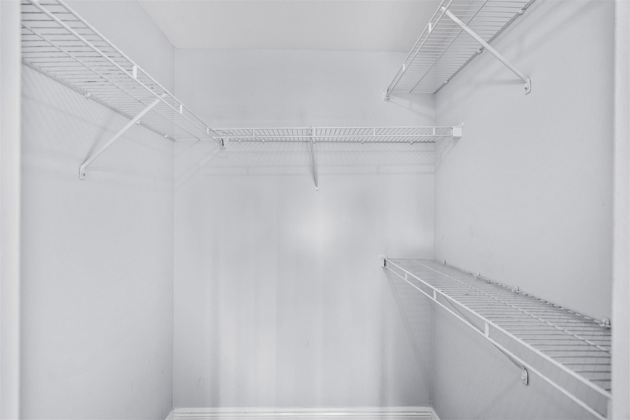 5880 West Sample Road, Unit 307 Coral Springs, FL 33067 - Photo 24 of 25 a view of small space with racks on the wall