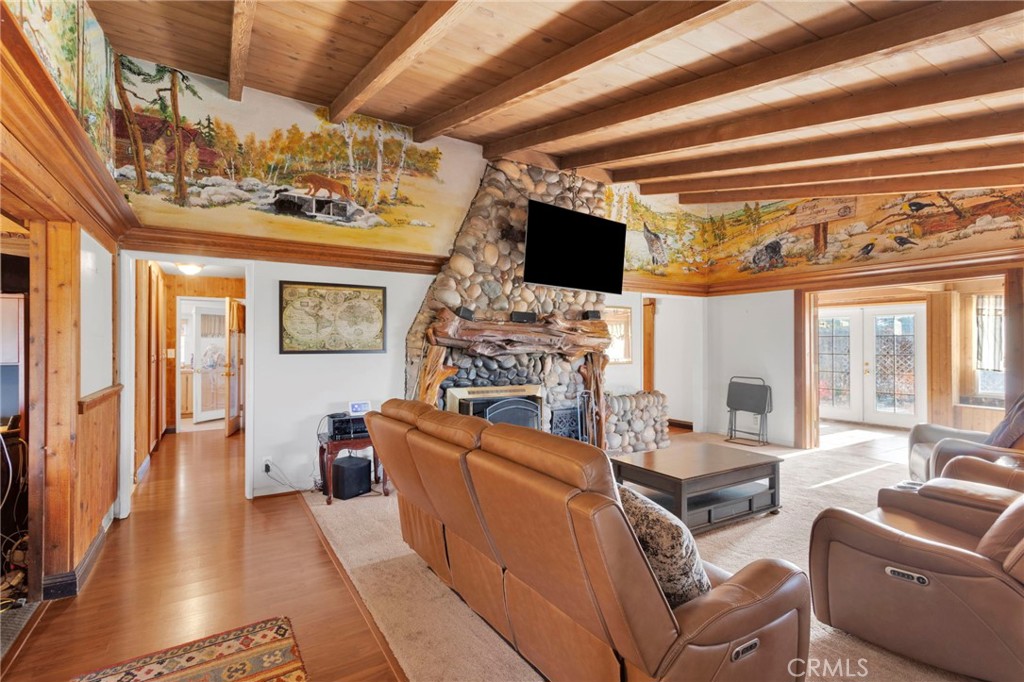 14415 Erie Road Apple Valley, CA 92307 - Photo 14 of 61 a living room with furniture and a flat screen tv
