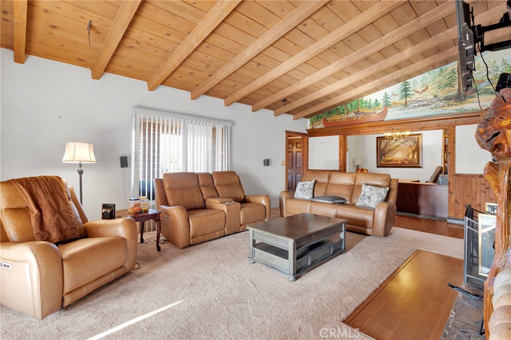 14415 Erie Road Apple Valley, CA 92307 - Photo 3 of 61 a living room with furniture and a chandelier