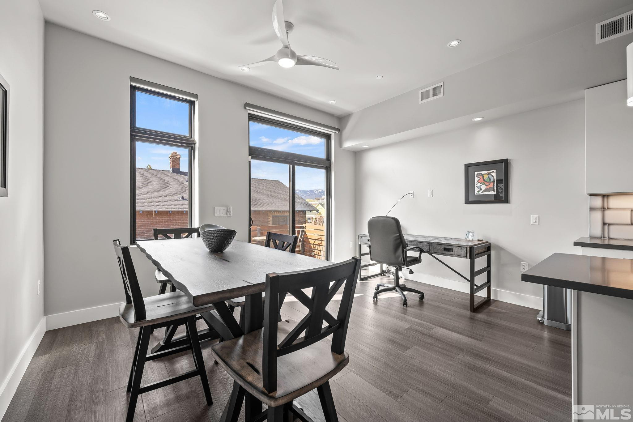 104 High Street Reno, NV 89502 - Photo 10 of 28 a view of a dining room with furniture window and wooden floor
