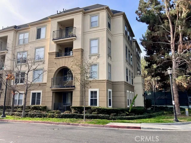 a front view of a multi story residential apartment building