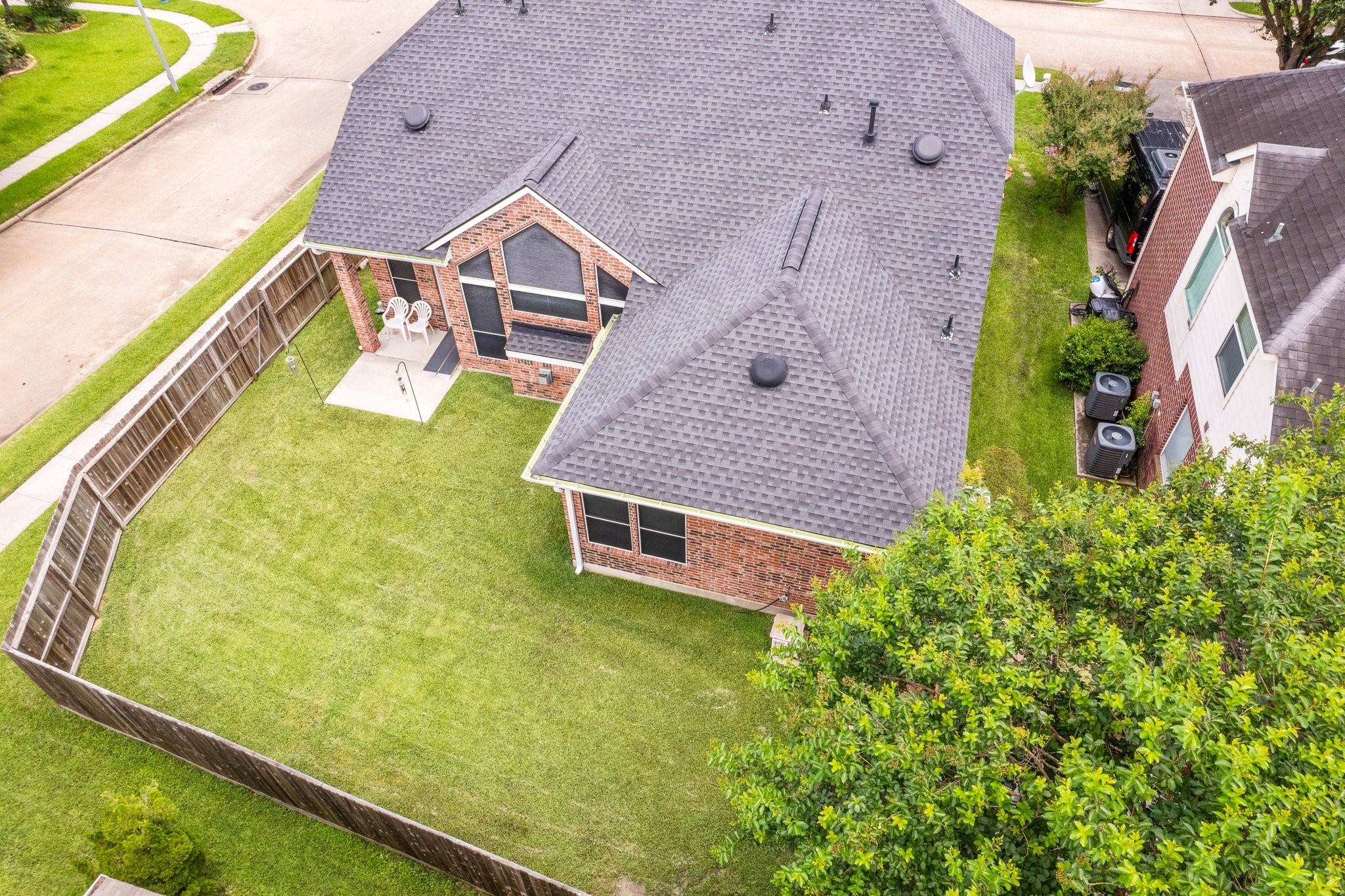 25447 China Springs Spring, TX 77373 - Photo 34 of 45 Large enough for gathering with loved ones yet easy enough to maintain, this backyard strikes the perfect balance between function and enjoyment.