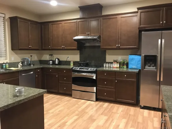 a kitchen with a sink and cabinets